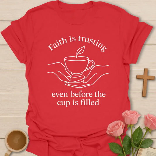 Faith Is Trusting shirt with cream vintage lettering and faith-inspired design. - Red