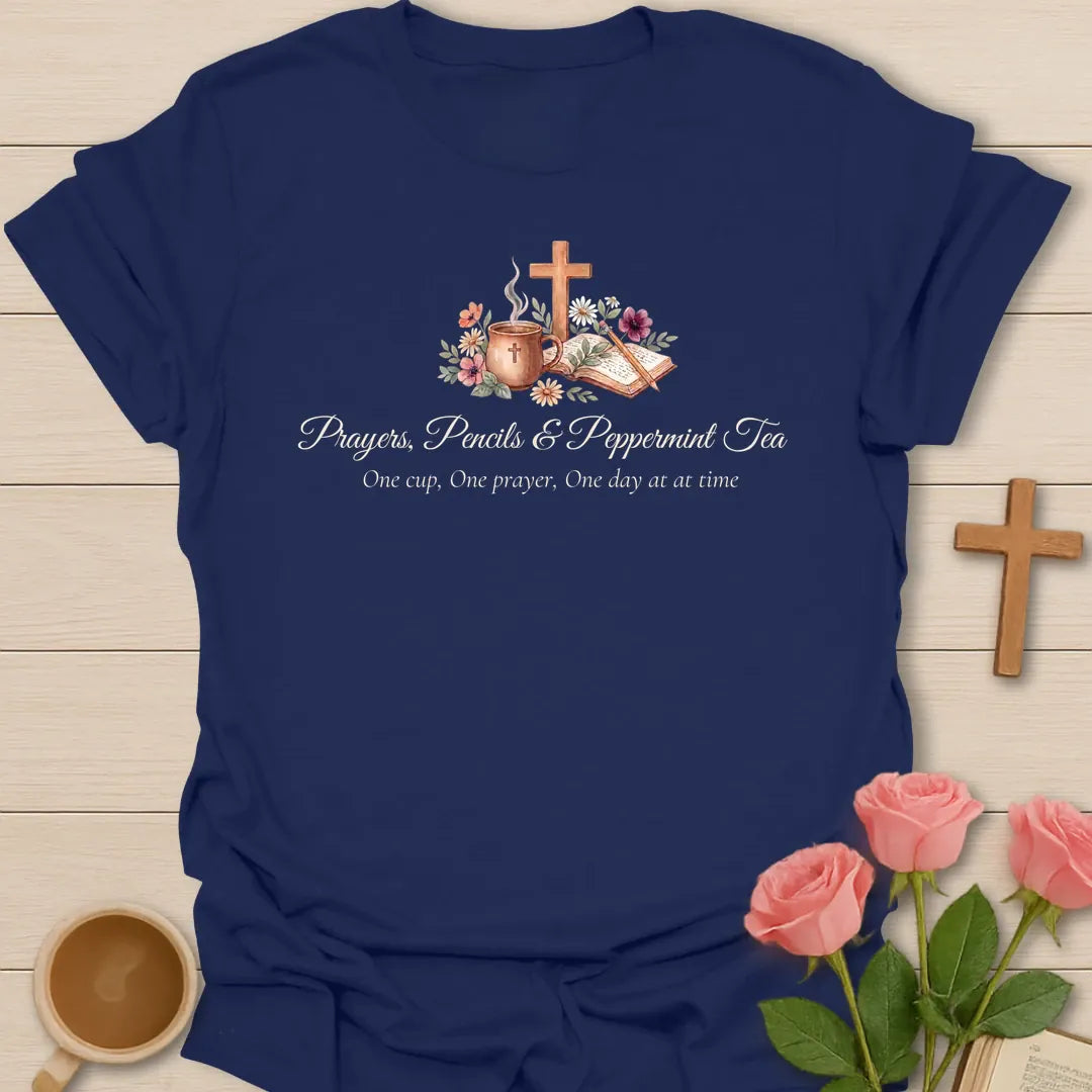 Prayers Pencils and Peppermint Tea shirt with teacup, cross, open Bible, flowers, pencil, and soft script lettering. - Navy