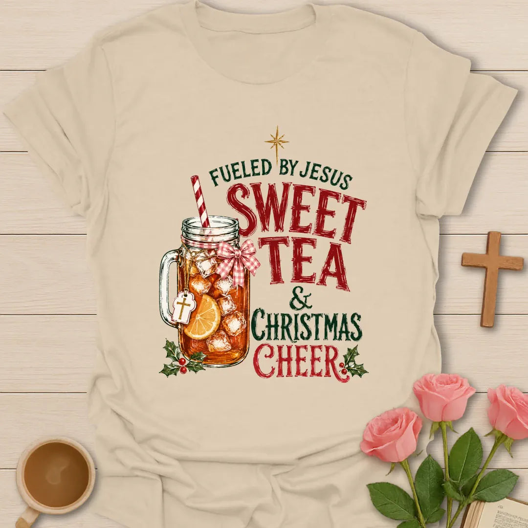 Fueled By Christmas Cheer t-shirt with holiday lettering and cozy Christmas tea design - Sand