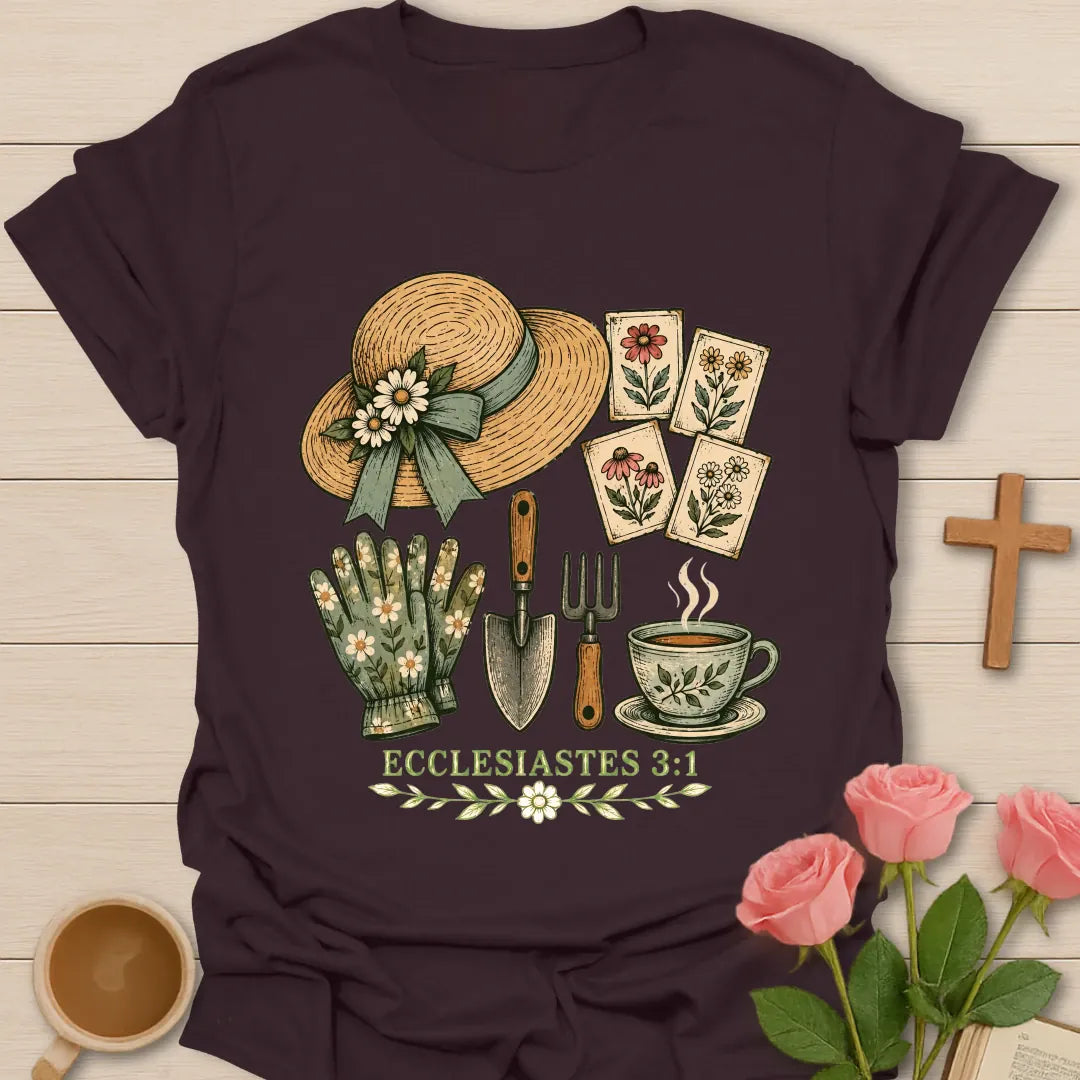 Gardening Faith Christian t-shirt with a straw sun hat, flower seed packets, gloves, trowel, garden fork, teacup and Ecclesiastes 3:1 - Dark Chocolate
