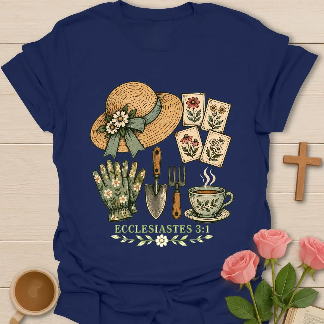 Gardening Faith Christian t-shirt with a straw sun hat, flower seed packets, gloves, trowel, garden fork, teacup and Ecclesiastes 3:1 - Navy