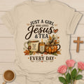 Girl who loves Jesus and tea every day shirt with teacup, candle, pumpkins, fall leaves, and faith message. - Sand