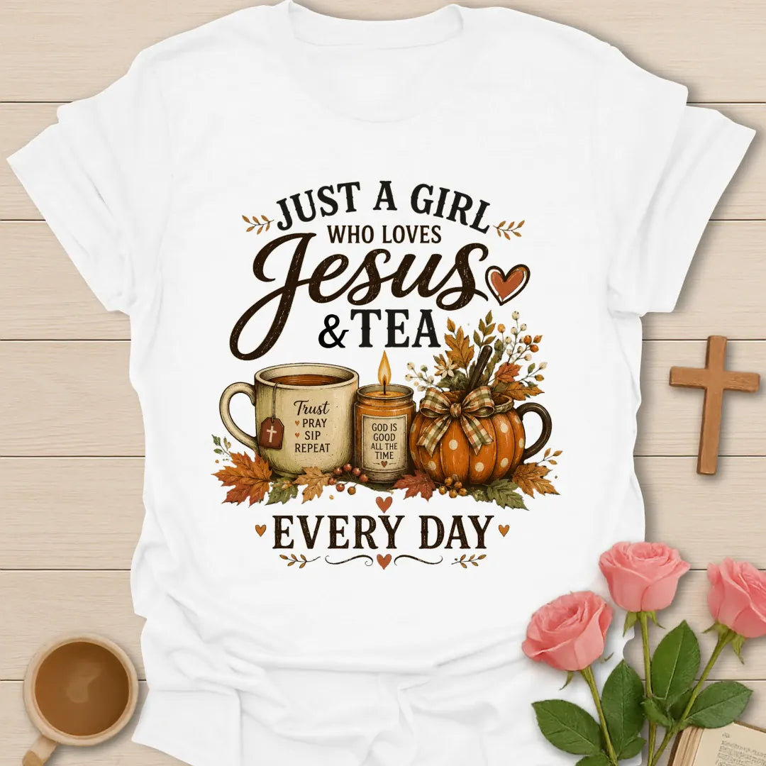 Girl who loves Jesus and tea every day shirt with teacup, candle, pumpkins, fall leaves, and faith message. - White
