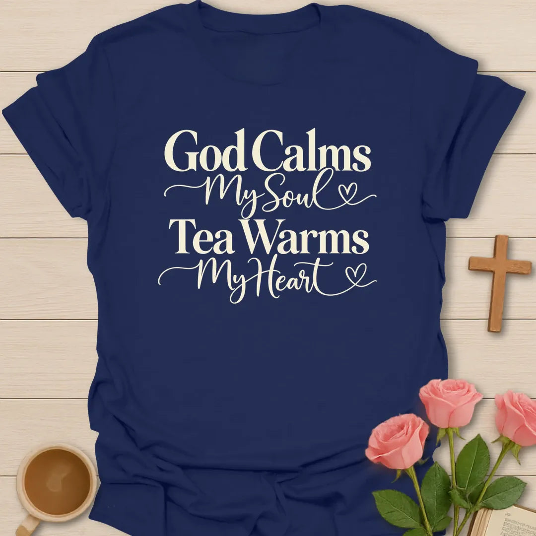 God Calms Tea Warms Christian tea t-shirt with calming lettering and faith-inspired design. - Navy