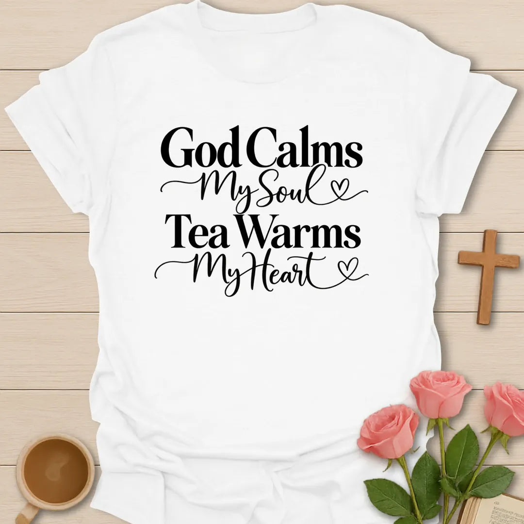 God Calms Tea Warms Christian tea t-shirt with calming lettering and faith-inspired design. - White