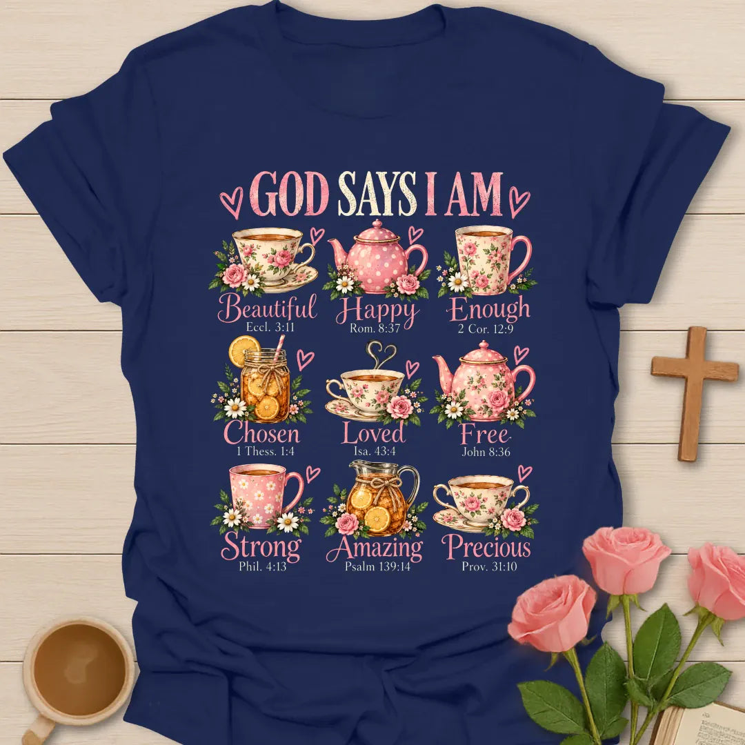 God Says I Am t-shirt with nine floral teacups and teapots labeled Beautiful, Happy, Enough, Chosen, Loved, Free, Strong, Amazing, and Precious with scripture references - Navy