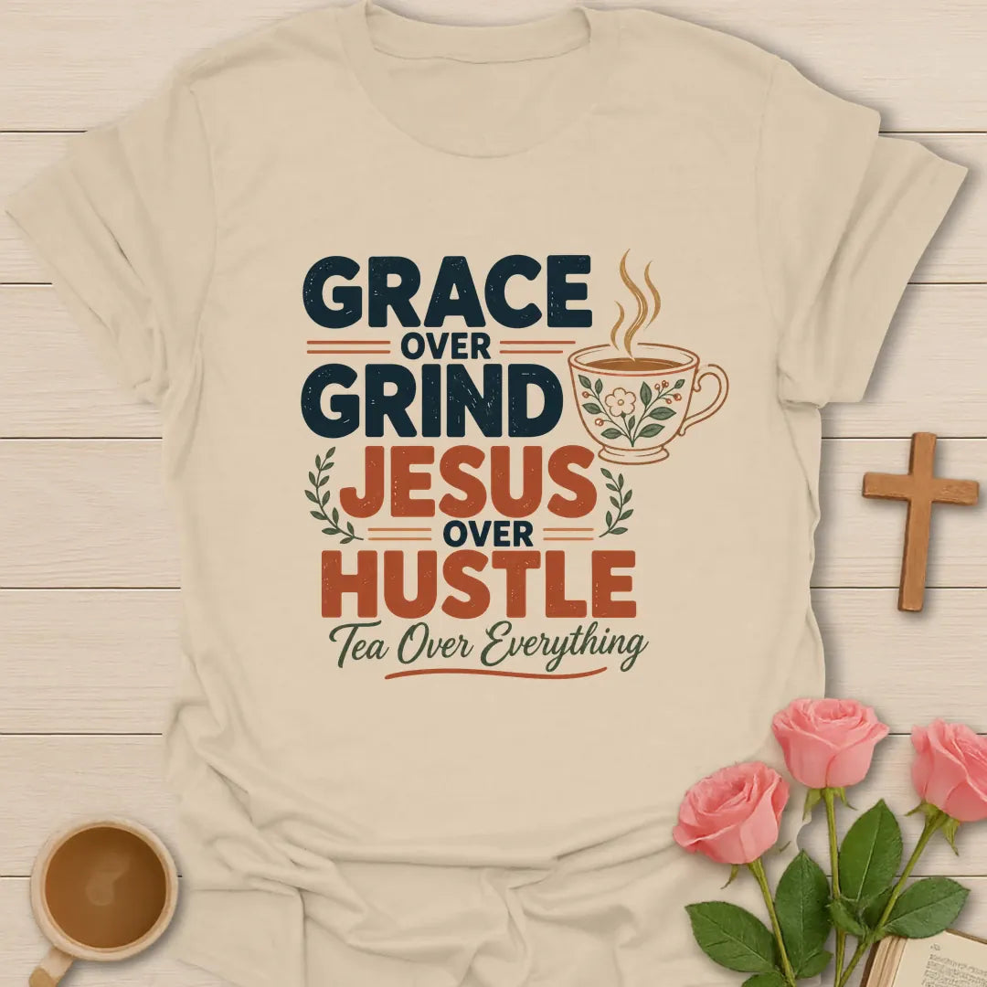 Grace Over Grind, Jesus Over Hustle, Tea Over Everything t-shirt with bold retro lettering and a floral teacup - Sand