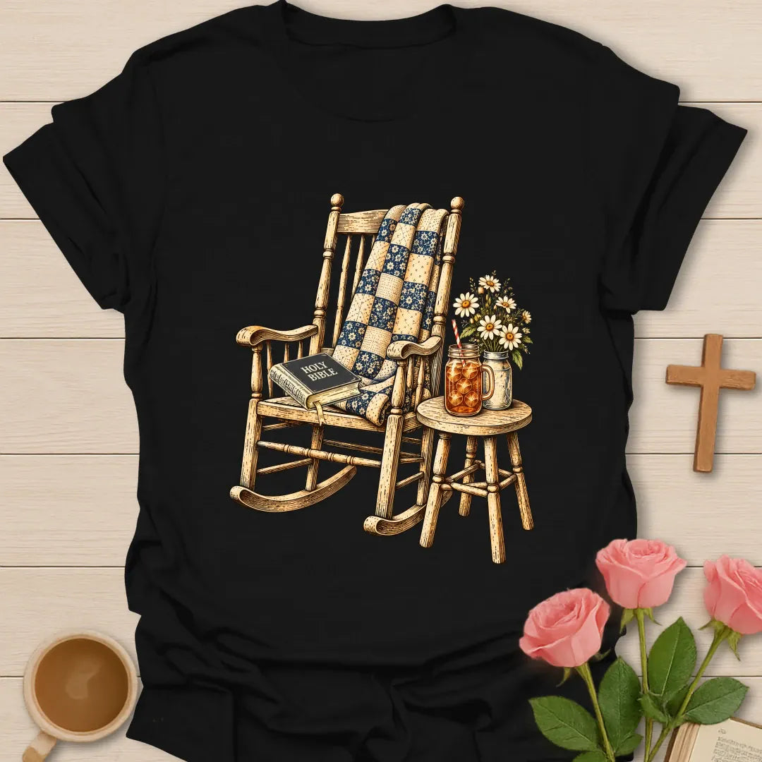 Grandma's Rocking Chair Christian t-shirt with a vintage wooden rocker, patchwork quilt, Holy Bible, iced tea jar, and daisies - Black