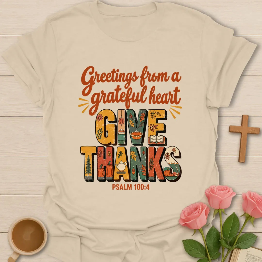 Greetings from a Grateful Heart Give Thanks fall Christian t-shirt with patterned autumn letters, teacup, Bible and Psalm 100:4 - Sand