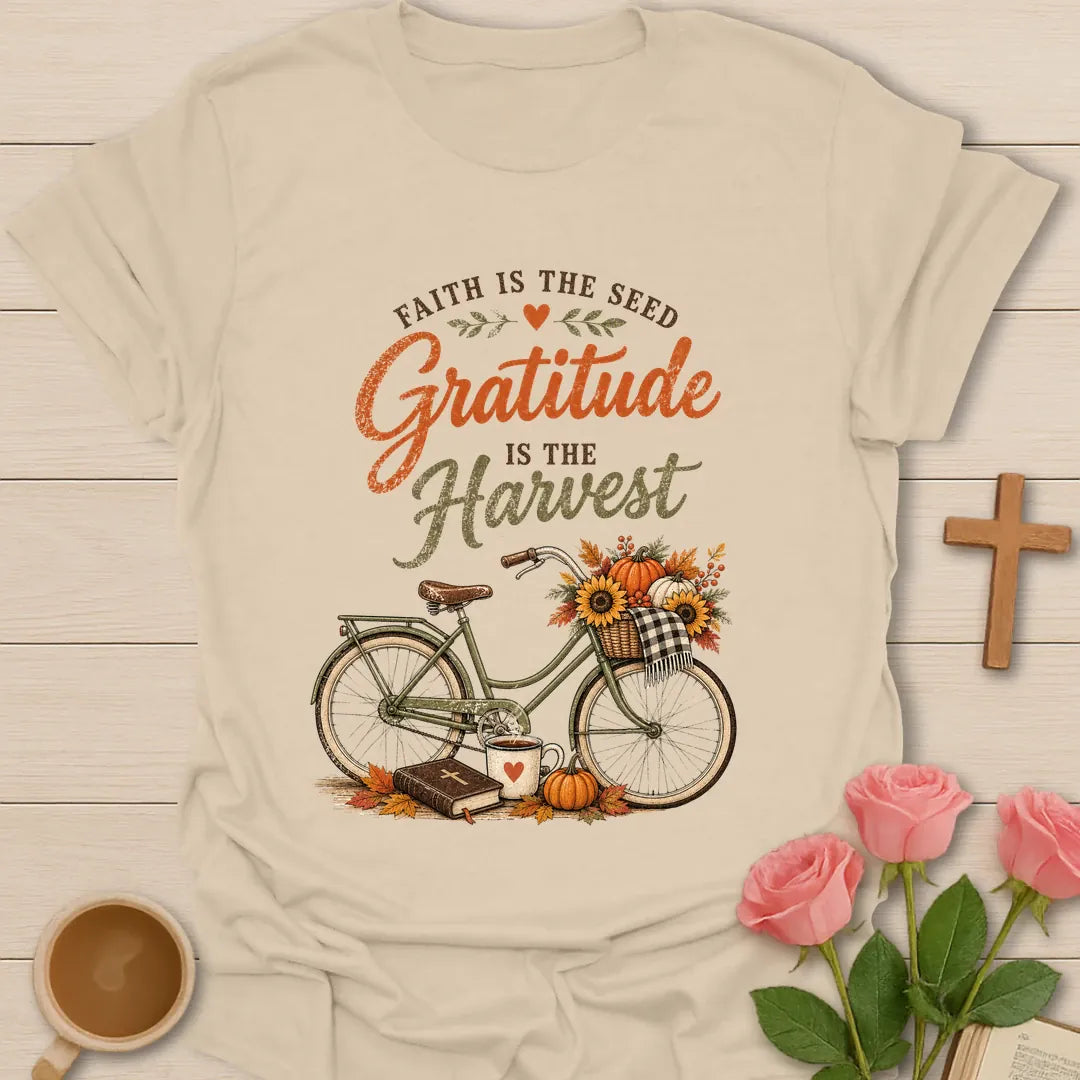 Gratitude Is The Harvest shirt with warm hand-lettered typography and a faith-inspired autumn design. - Sand