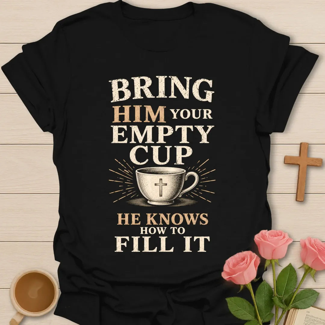 Bring Him Your Empty Cup, He Knows How To Fill It t-shirt with vintage lettering and a teacup marked with a cross. - Black