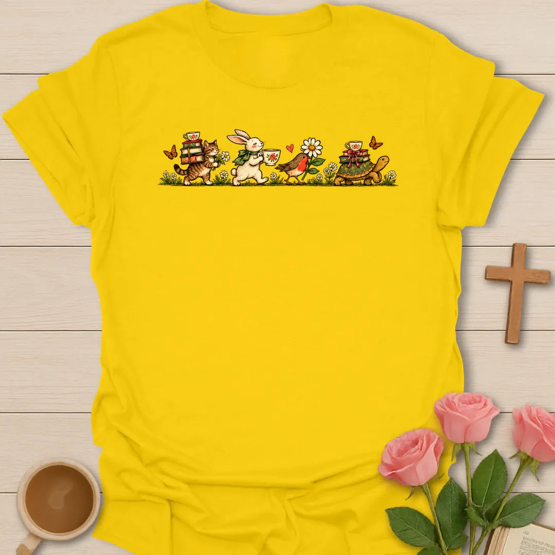 Heading To The Tea Party t-shirt with a vintage parade of a cat carrying books, a bunny with a teacup, a robin and a tortoise with a teacup - Daisy