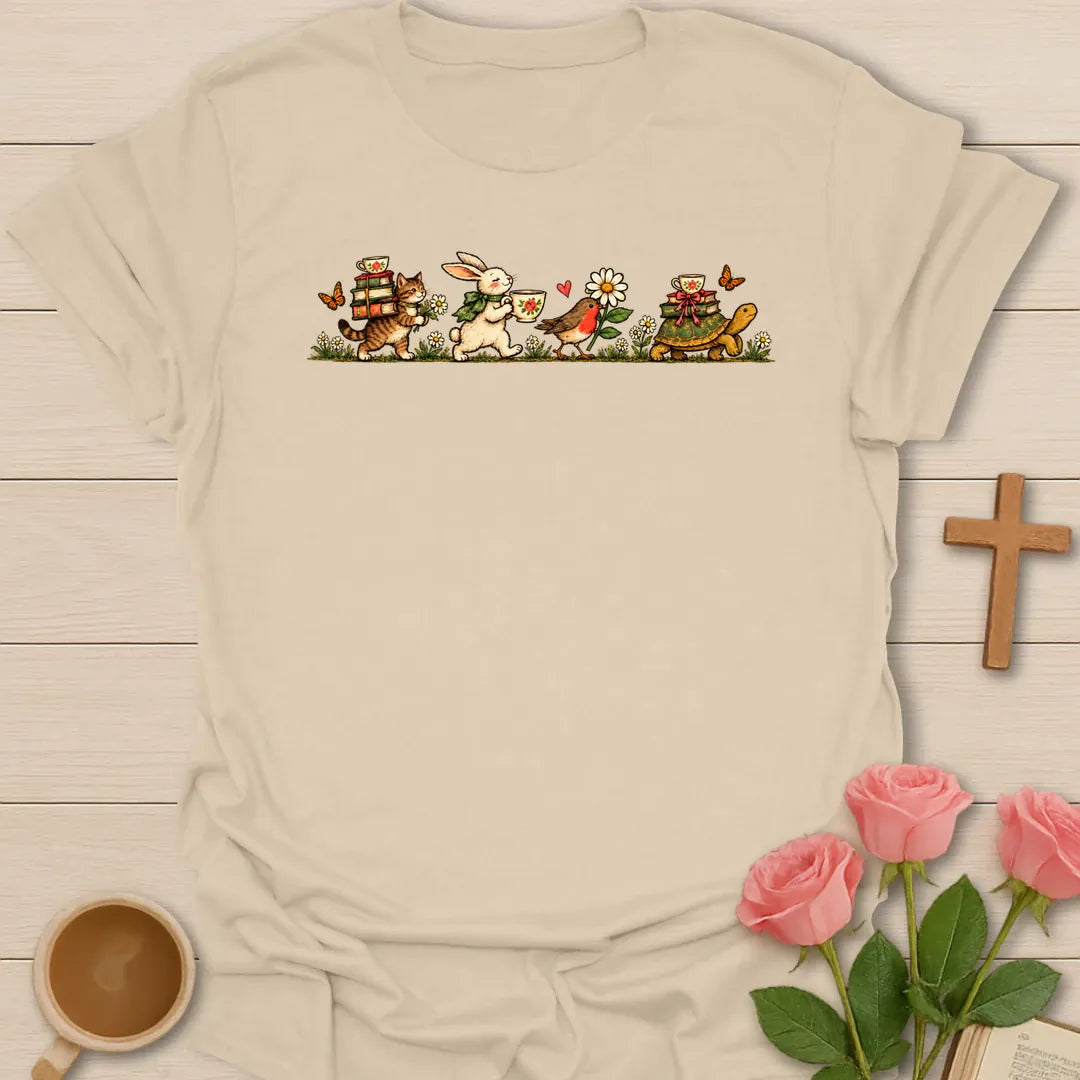 Heading To The Tea Party t-shirt with a vintage parade of a cat carrying books, a bunny with a teacup, a robin and a tortoise with a teacup - Sand