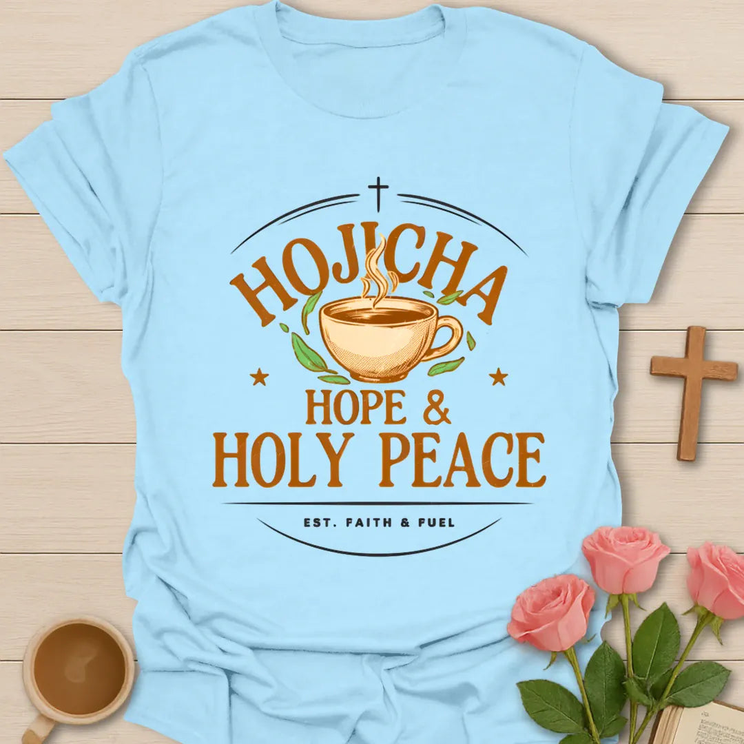 Hojicha Hope and Holy Peace shirt with steaming teacup, cross, leaves, and faith fuel text. - Light Blue