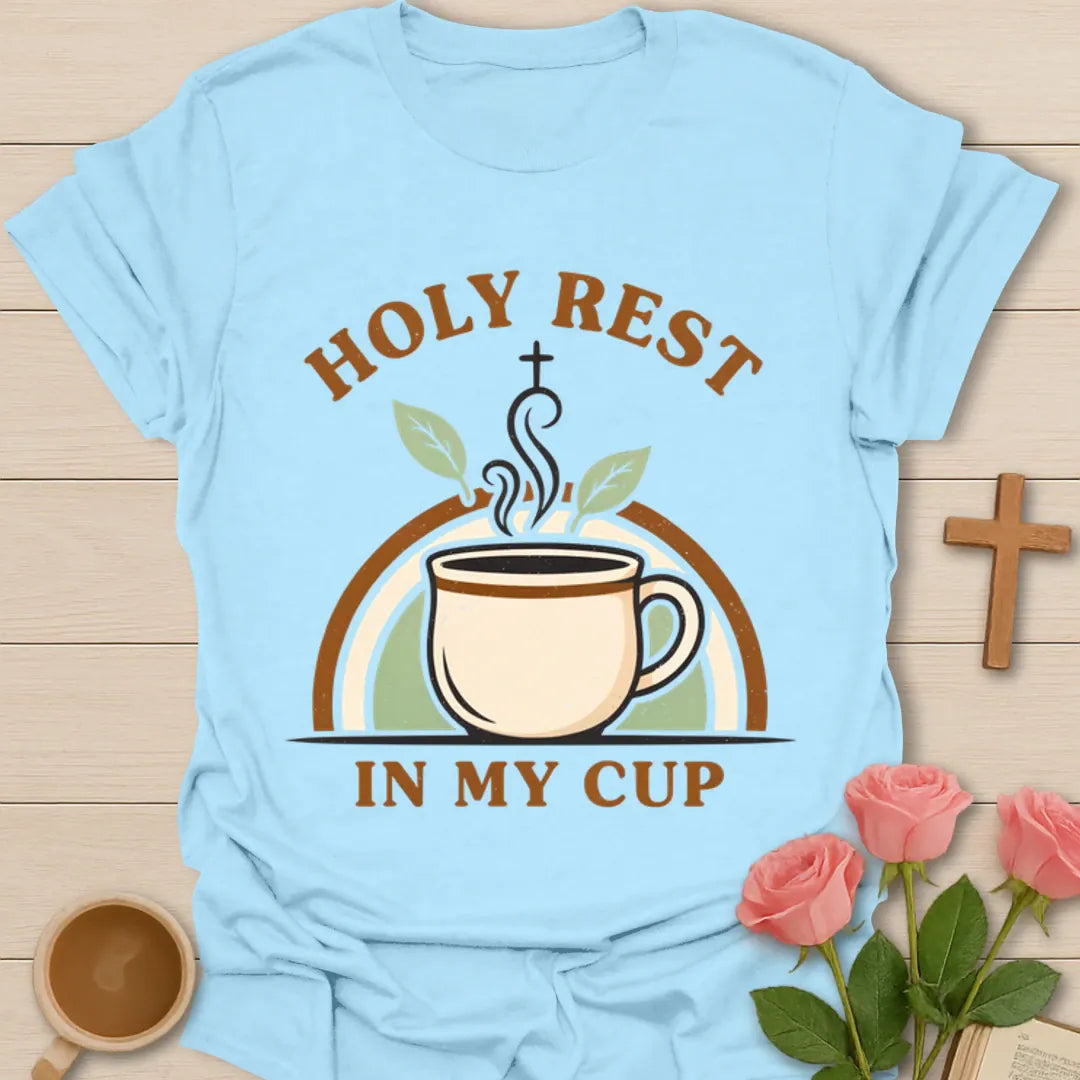 Holy Rest In My Cup Christian shirt with steaming teacup, cross, leaves, and retro rainbow design. - Light Blue
