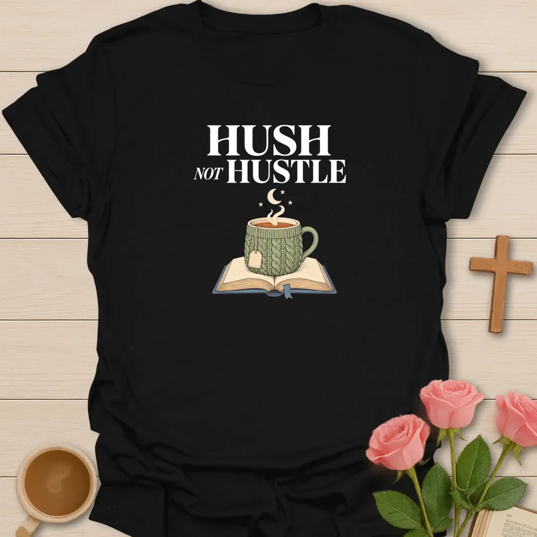 Hush Not Hustle shirt with cross and cream vintage lettering. - Black