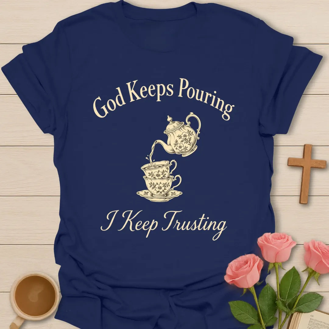 God Keeps Pouring I Keep Trusting Christian t-shirt with vintage teapot pouring into stacked teacups - Navy