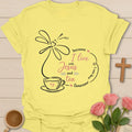 I Live With Jesus and Tea shirt with teacup, cross, floral accents, and simple Christian tea design. - Cornsilk