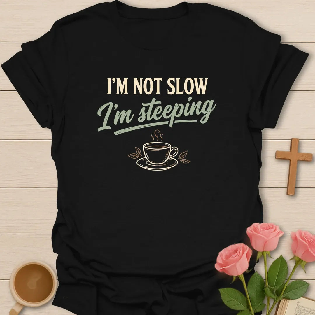 I'm Not Slow shirt with playful lettering and faith-inspired tea design. - Black
