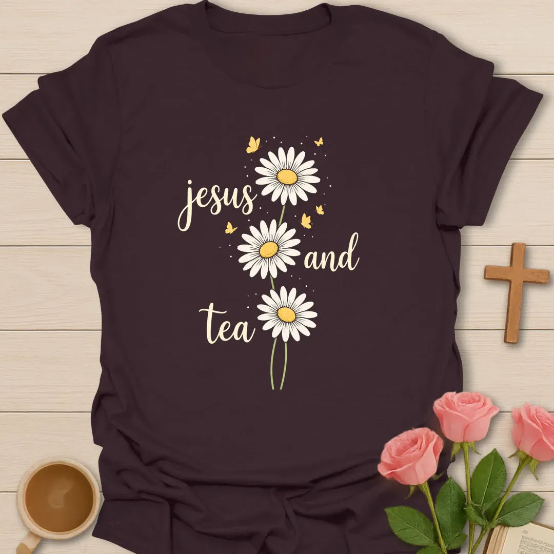 Jesus and Tea daisy shirt with three white daisies, yellow butterflies, cream script lettering, and airy botanical accents. - Dark Chocolate