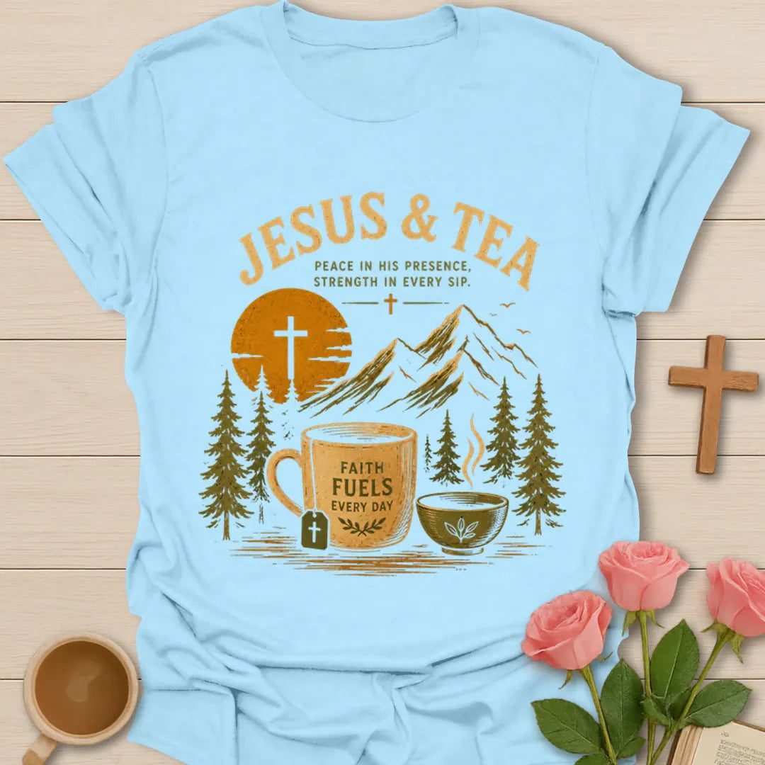 Jesus and Tea mountain shirt with mug, teacup, cross, tea bag, pine trees, and sunset design. - Light Blue