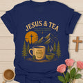 Jesus and Tea mountain shirt with mug, teacup, cross, tea bag, pine trees, and sunset design. - Navy