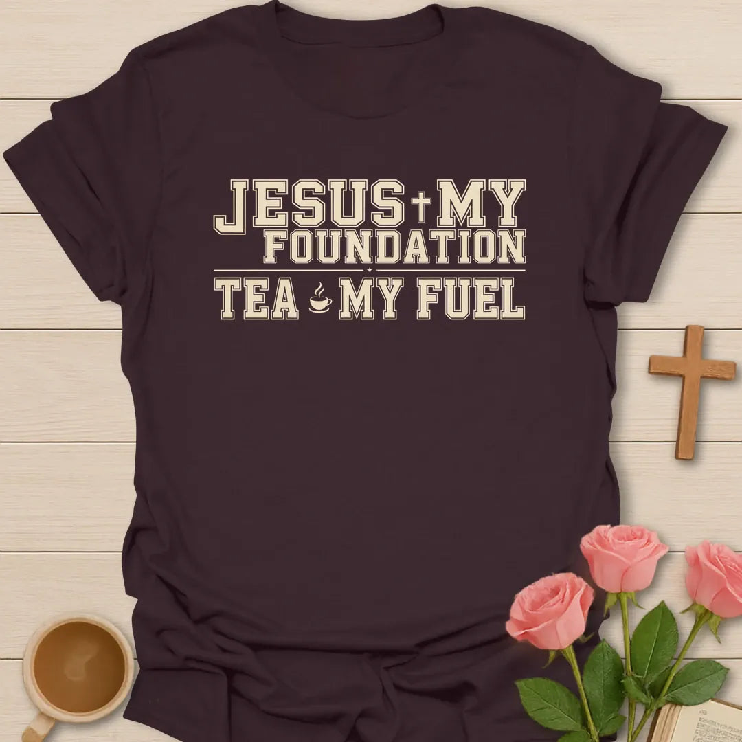Jesus My Foundation Tea My Fuel shirt with varsity cream lettering, small teacup icon, cross, and distressed vintage style. - Dark Chocolate