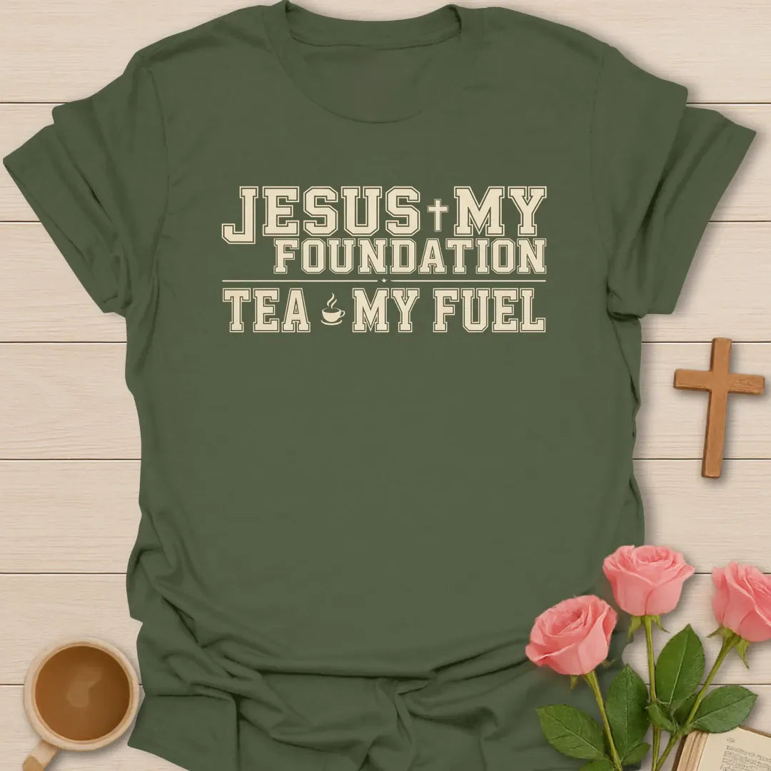Jesus My Foundation Tea My Fuel shirt with varsity cream lettering, small teacup icon, cross, and distressed vintage style. - Military Green