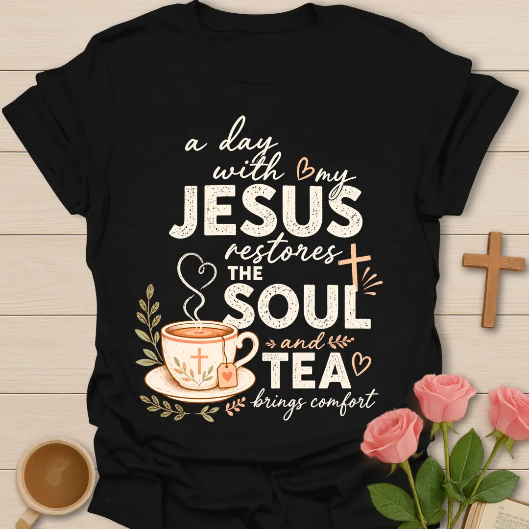 Jesus Restores The Soul and Tea Brings Comfort shirt with teacup, cross, tea tag, leaves, and soft vintage lettering. - Black