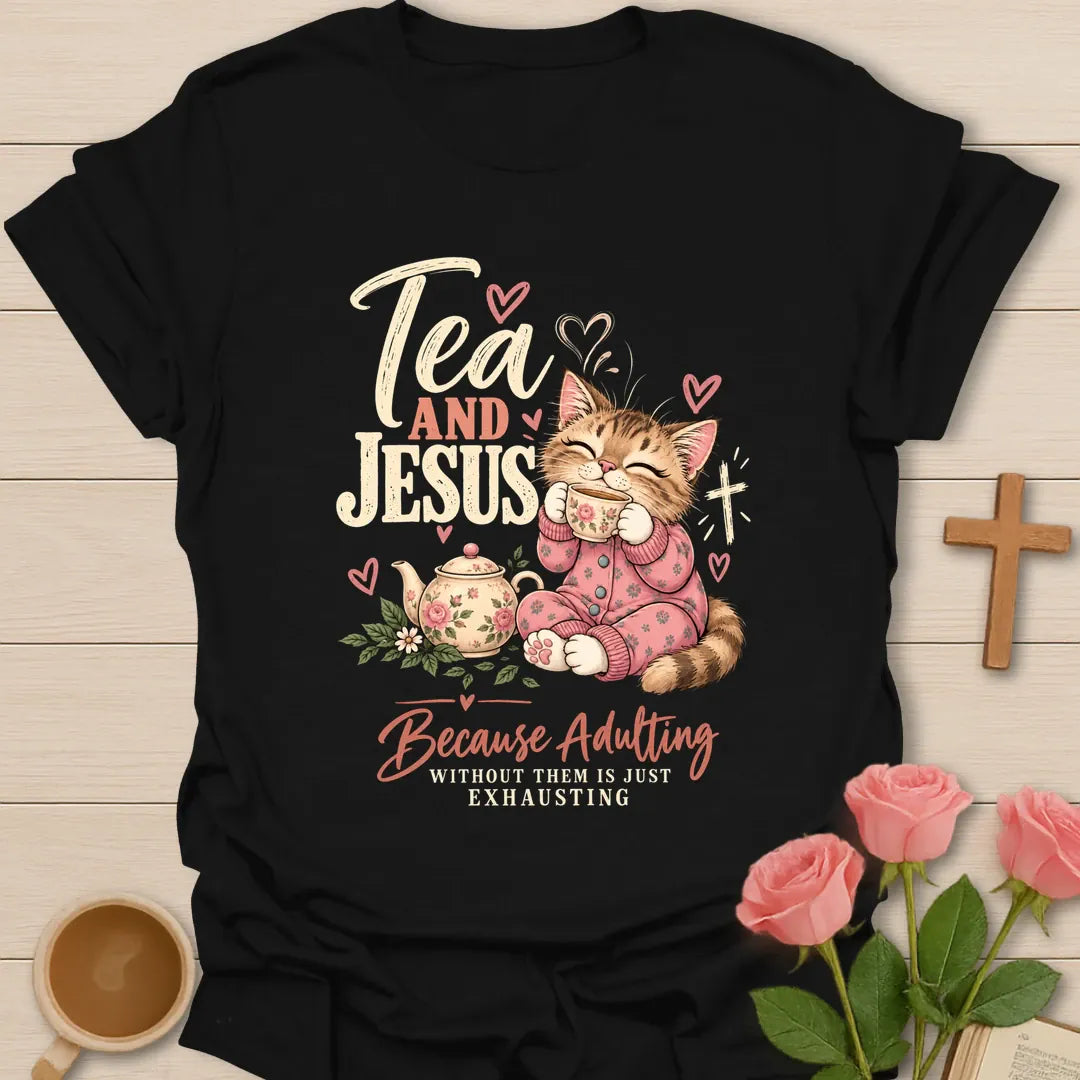 Tea and Jesus Because Adulting Without Them Is Just Exhausting t-shirt with a cat in pink pajamas sipping tea beside a floral teapot and cross - Black
