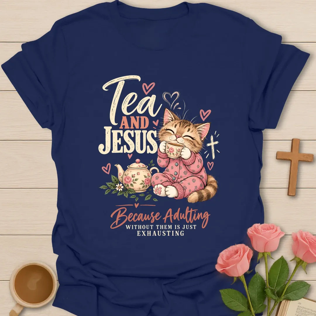 Tea and Jesus Because Adulting Without Them Is Just Exhausting t-shirt with a cat in pink pajamas sipping tea beside a floral teapot and cross - Navy