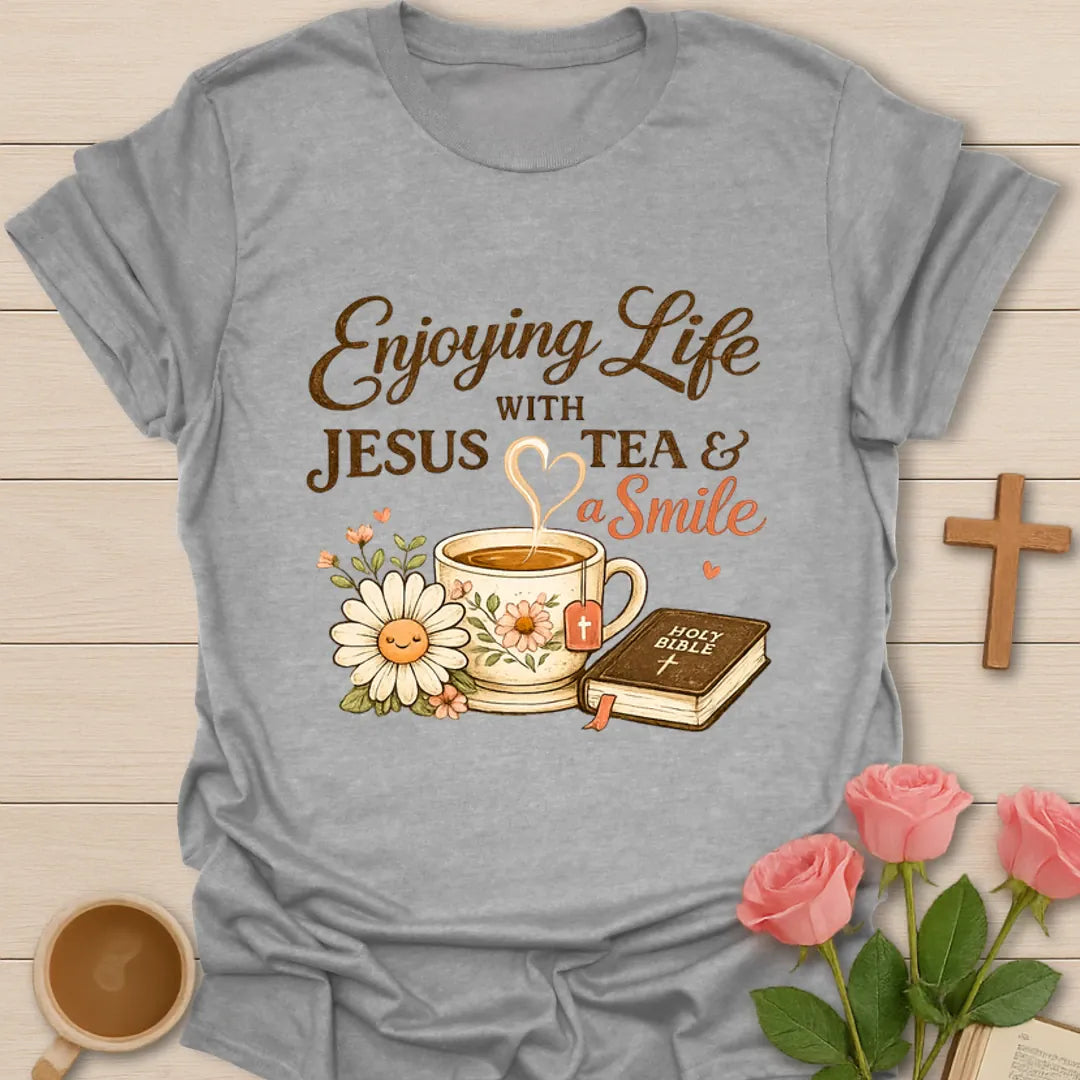 Enjoying Life With Jesus Tea and a Smile shirt with teacup, Bible, flowers, and heart-shaped steam. - Sport Grey