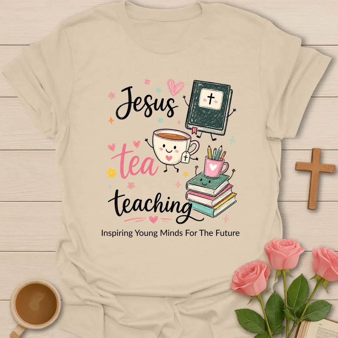 Jesus Tea Teaching shirt with black script text, pink tea lettering, smiling tea cup, Bible, books, pencil cup, stars, hearts, and floral doodles. - Sand