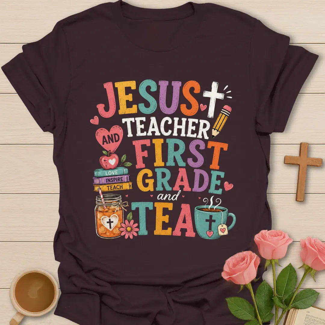 Jesus Teacher First Grade and Tea shirt with bright stacked lettering, cross, pencil, book stack, iced tea jar, hot tea cup, apple, and hearts. - Dark Chocolate