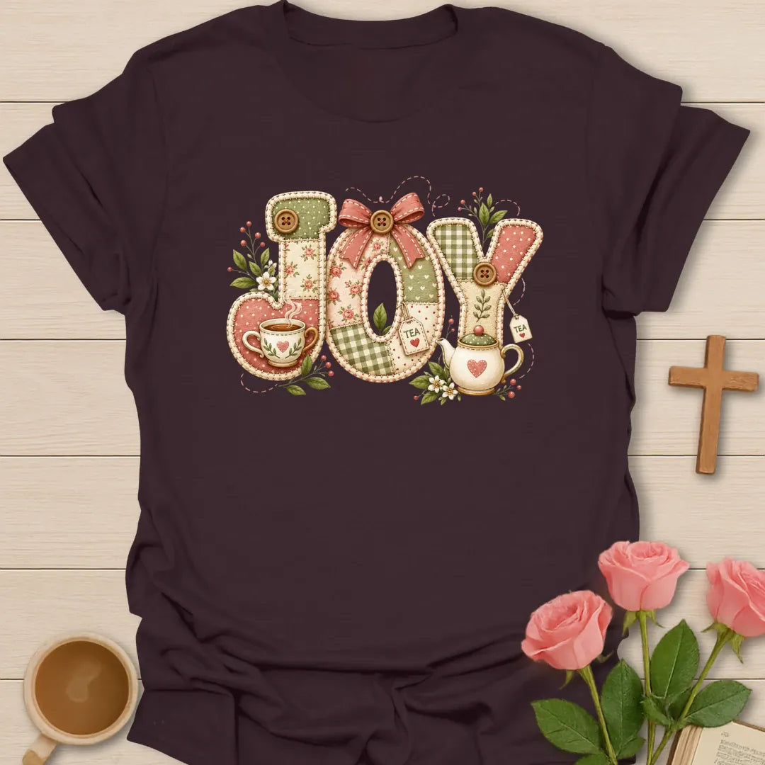Joy Tea faux patchwork shirt with stitched fabric letters, pink bow, teacup, teapot, tea tags, florals, and soft cottagecore colors. - Dark Chocolate