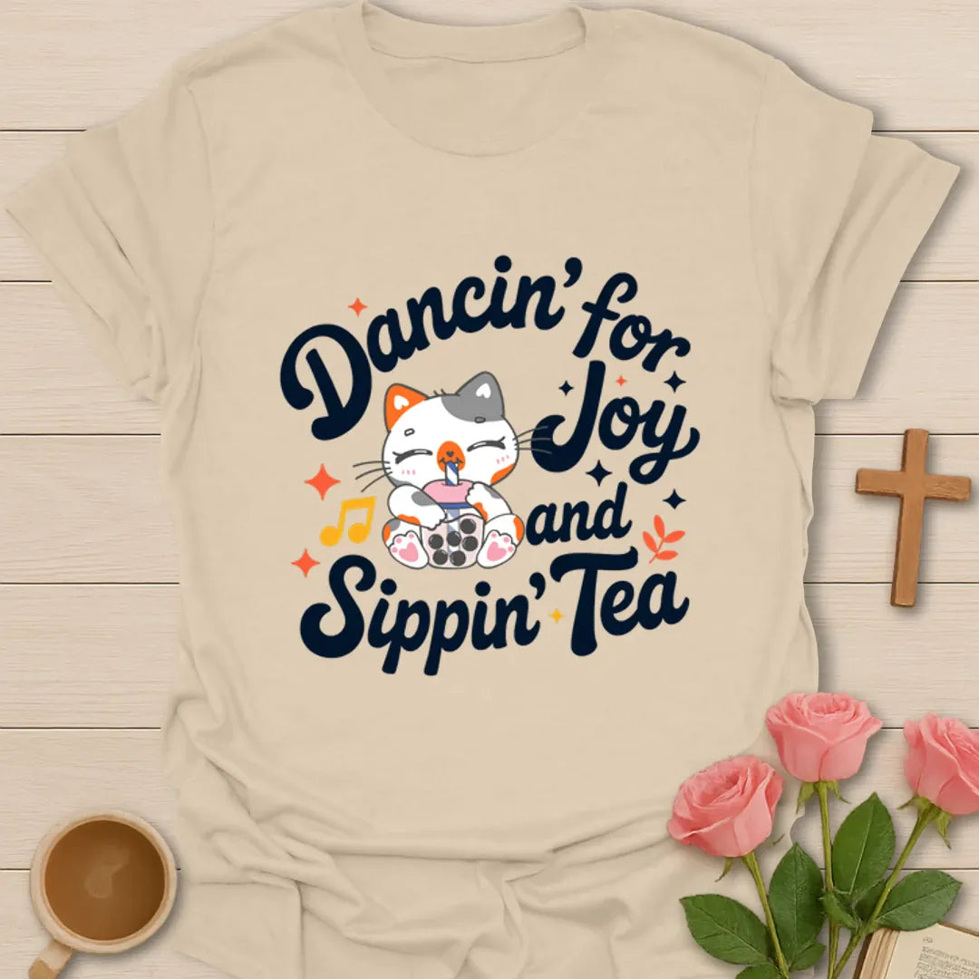 Kitty Dancin For Joy shirt with cute cat drinking bubble tea, music notes, stars, and retro lettering. - Sand