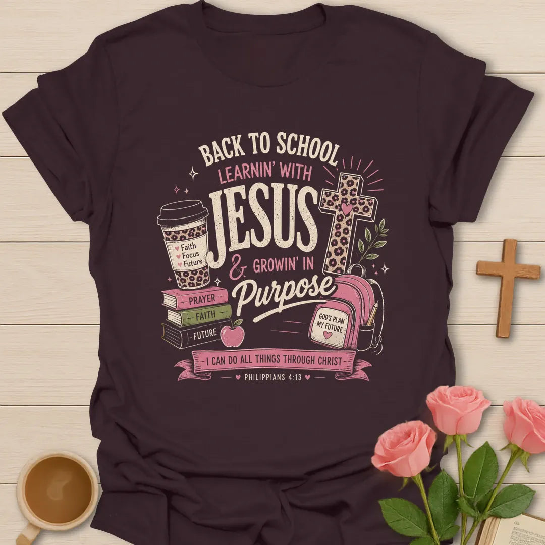 Learning With Jesus back to school shirt with books, backpack, cross, coffee cup, apple, and Philippians 4:13 text. - Dark Chocolate