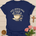 Let Jesus Fill Your Cup shirt with teacup, steam, leaves, tea tag, and Psalm 23:5 text. - Navy