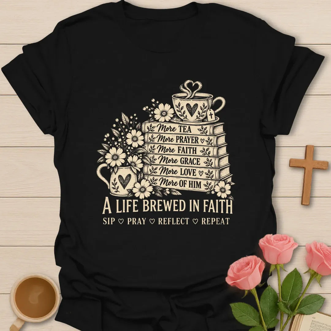A Life Brewed In Faith Christian t-shirt with a stack of books labeled more tea, more prayer, more faith, more grace, a teacup, and flowers - Black