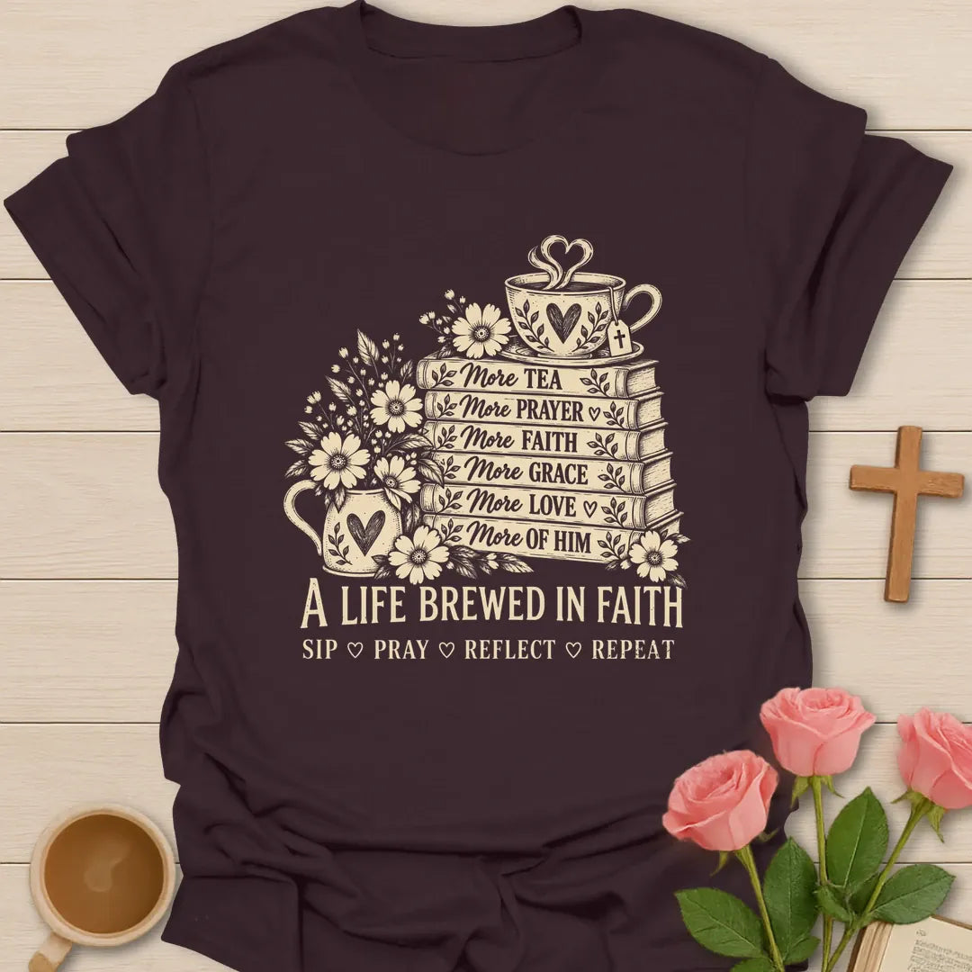 A Life Brewed In Faith Christian t-shirt with a stack of books labeled more tea, more prayer, more faith, more grace, a teacup, and flowers - Dark Chocolate