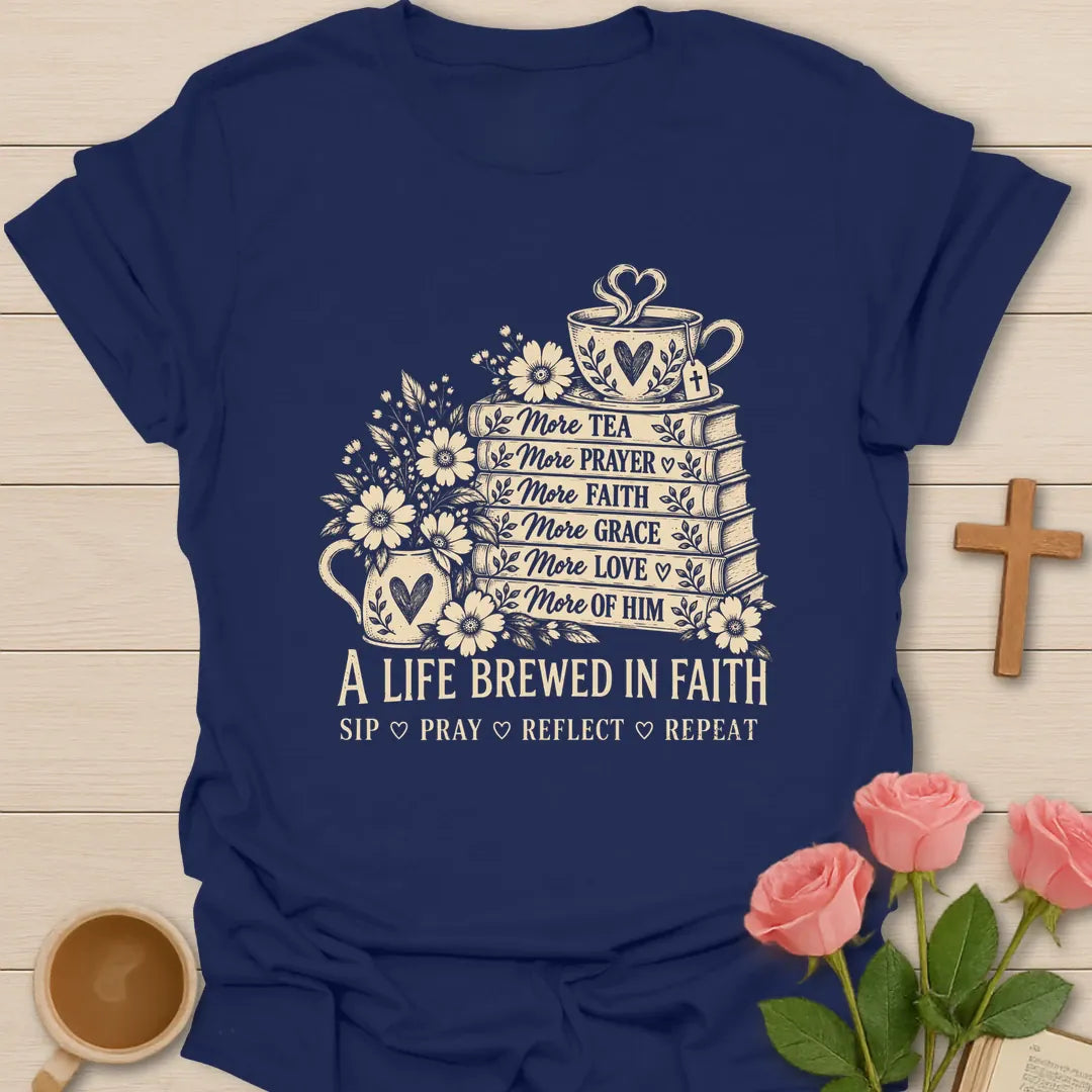 A Life Brewed In Faith Christian t-shirt with a stack of books labeled more tea, more prayer, more faith, more grace, a teacup, and flowers - Navy