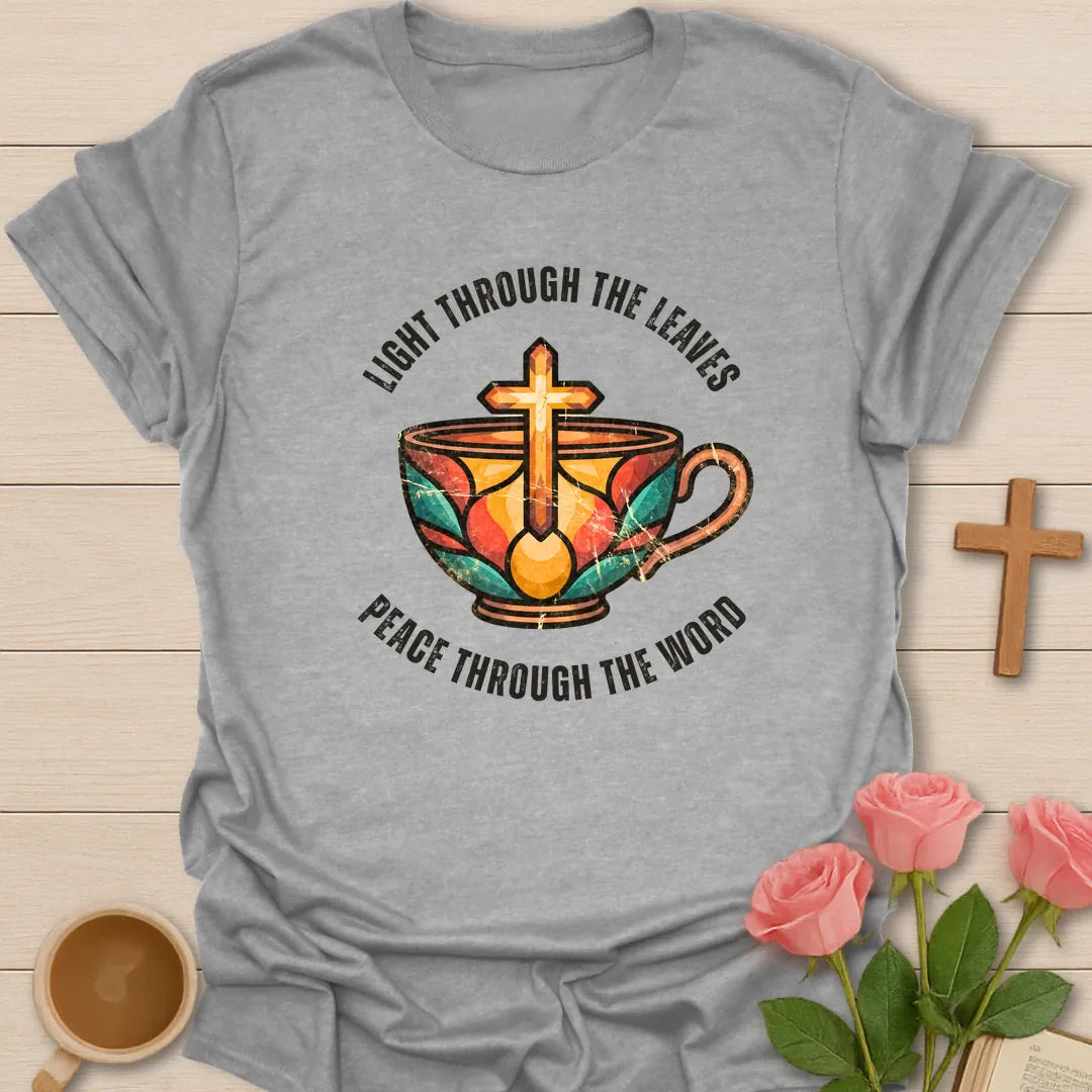 Light Through The Leaves, Peace Through The Word t-shirt with a stained-glass style teacup and golden cross - Sport Grey