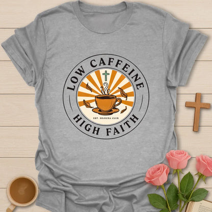 Low Caffeine High Faith shirt with Hojicha tea cup, sunburst, cross, falling leaves, and circular badge design. - Sport Grey