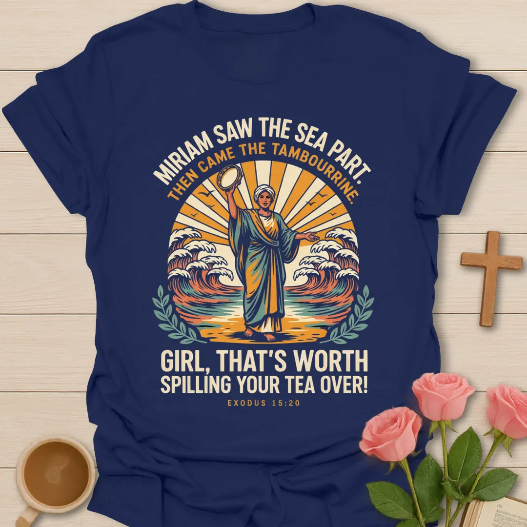Miriam Saw The Sea Part Christian tea shirt with Miriam raising a tambourine before parted waves and sunburst, Exodus 15:20 - Navy