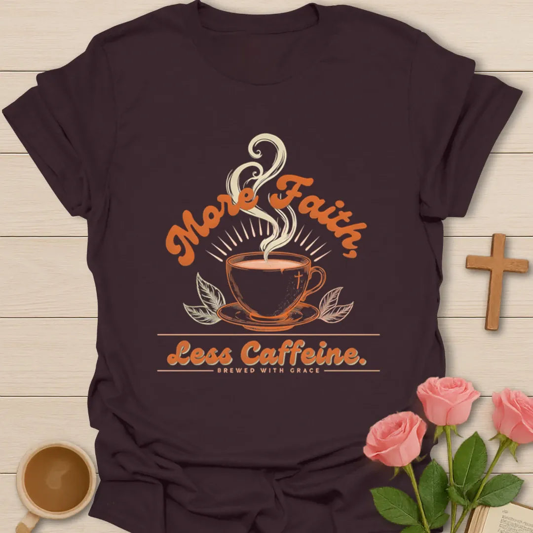 More Faith Less Caffeine shirt with steaming teacup, leaves, sunburst, and vintage orange lettering. - Dark Chocolate