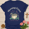 Morning Grace Grows Here shirt with teacup filled with flowers, chamomile, lavender, mint, and soft vintage colors. - Navy