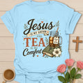 My Comfort Christian tea shirt with Jesus and tea phrase, teacup, cross, flowers, and cozy faith artwork. - Light Blue