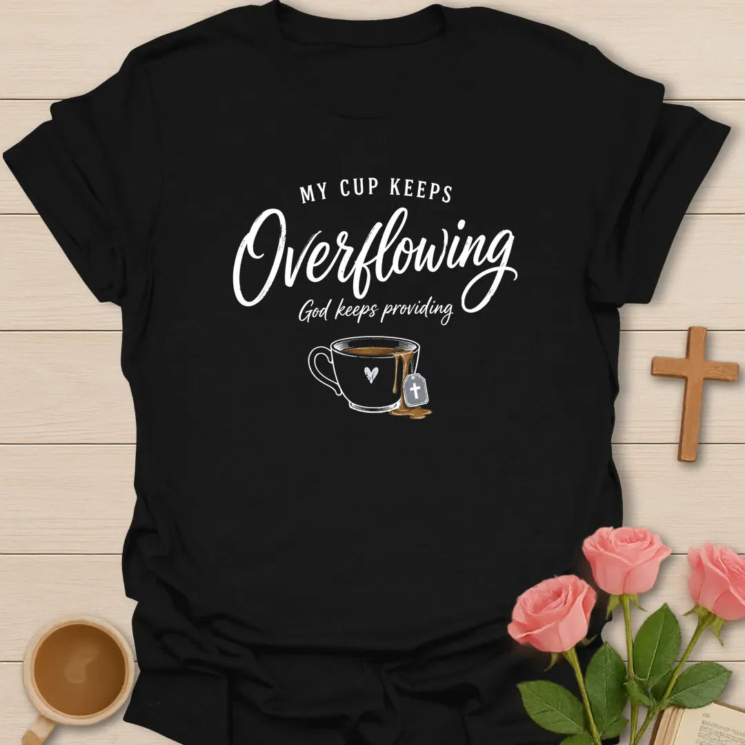 My Cup Keeps Overflowing Christian tea t-shirt with teacup and faith-inspired lettering - Black