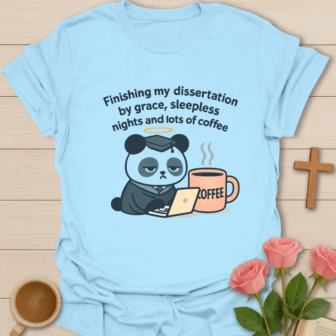 Dissertation grace coffee shirt with sleepy panda in graduation cap, laptop, oversized coffee mug, halo, and curved text. - Light Blue