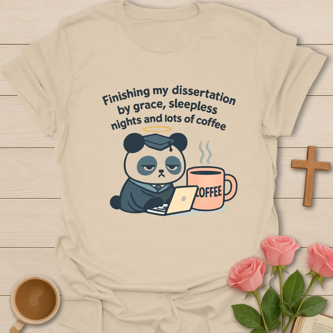 Dissertation grace coffee shirt with sleepy panda in graduation cap, laptop, oversized coffee mug, halo, and curved text. - Sand